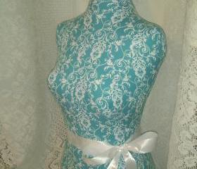 Boutique Dress form designs with stand, life size torso great for store front display or home decor. Teal scroll print. 